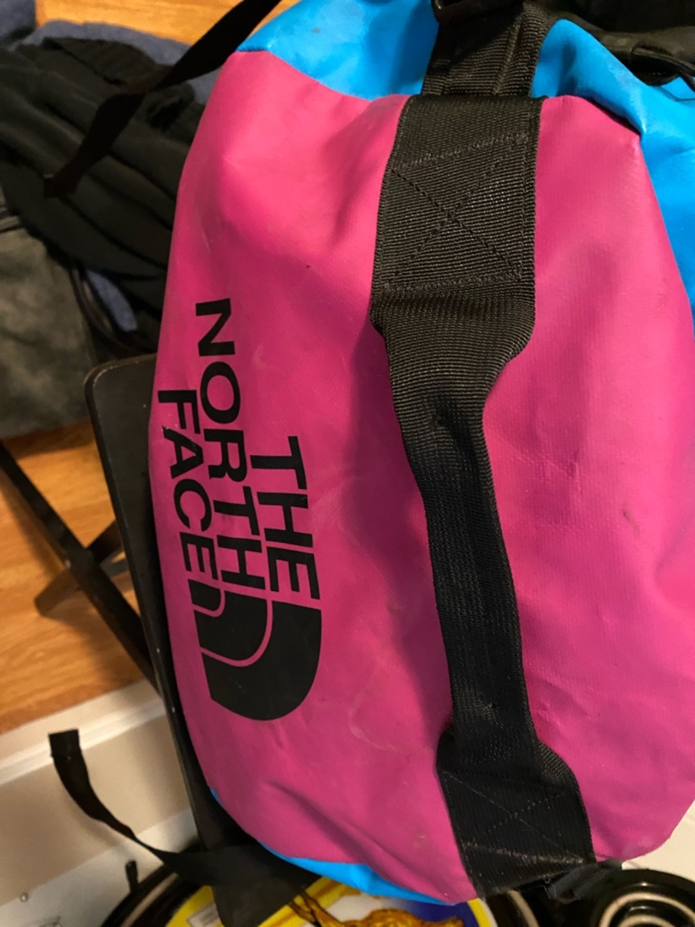 The North Face Pink and Blue Travel Duffel Bag with Black Straps